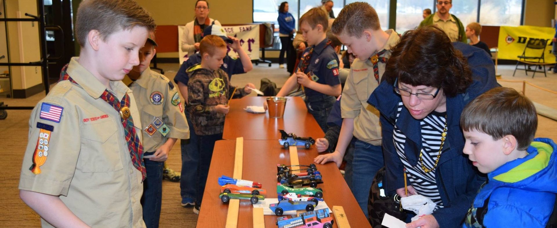 Scouts working on model cars