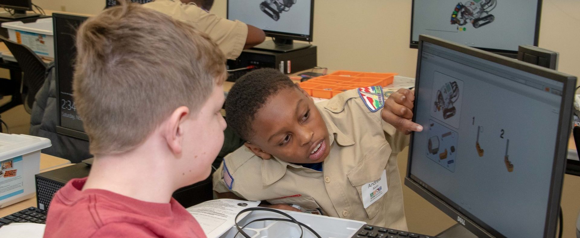 Scouts working on a computer