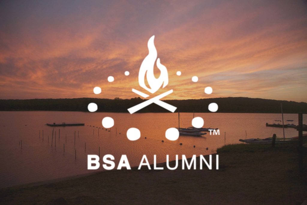 BSA Alumni over a camp sunset picture.