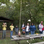 scouts and parents putting mentos in soda explosion photo