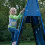 scout on climbing wall photo