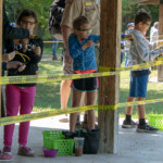 scouts shooting slingshot photo