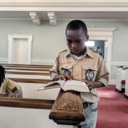 Scouts read sacred texts