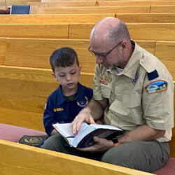 Scouts read sacred texts